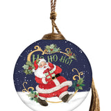 Hand-painted glass ornament featuring a joyful Santa Claus holding a gift, with "Ho Ho Ho" written above, set against a snowy night sky.
