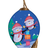 Penguins and Presents Glass Ornament
