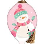 Hand-painted glass ornament featuring a cheerful snowman in a pink hat and scarf on a light pink background.