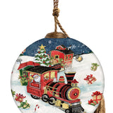 Hand-painted glass ornament featuring Santa driving a festive red train through a snowy scene with presents and a Christmas tree.