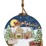 Hand-painted glass ornament featuring Santa flying in his sleigh over a snow-covered workshop, surrounded by festive Christmas trees and presents.